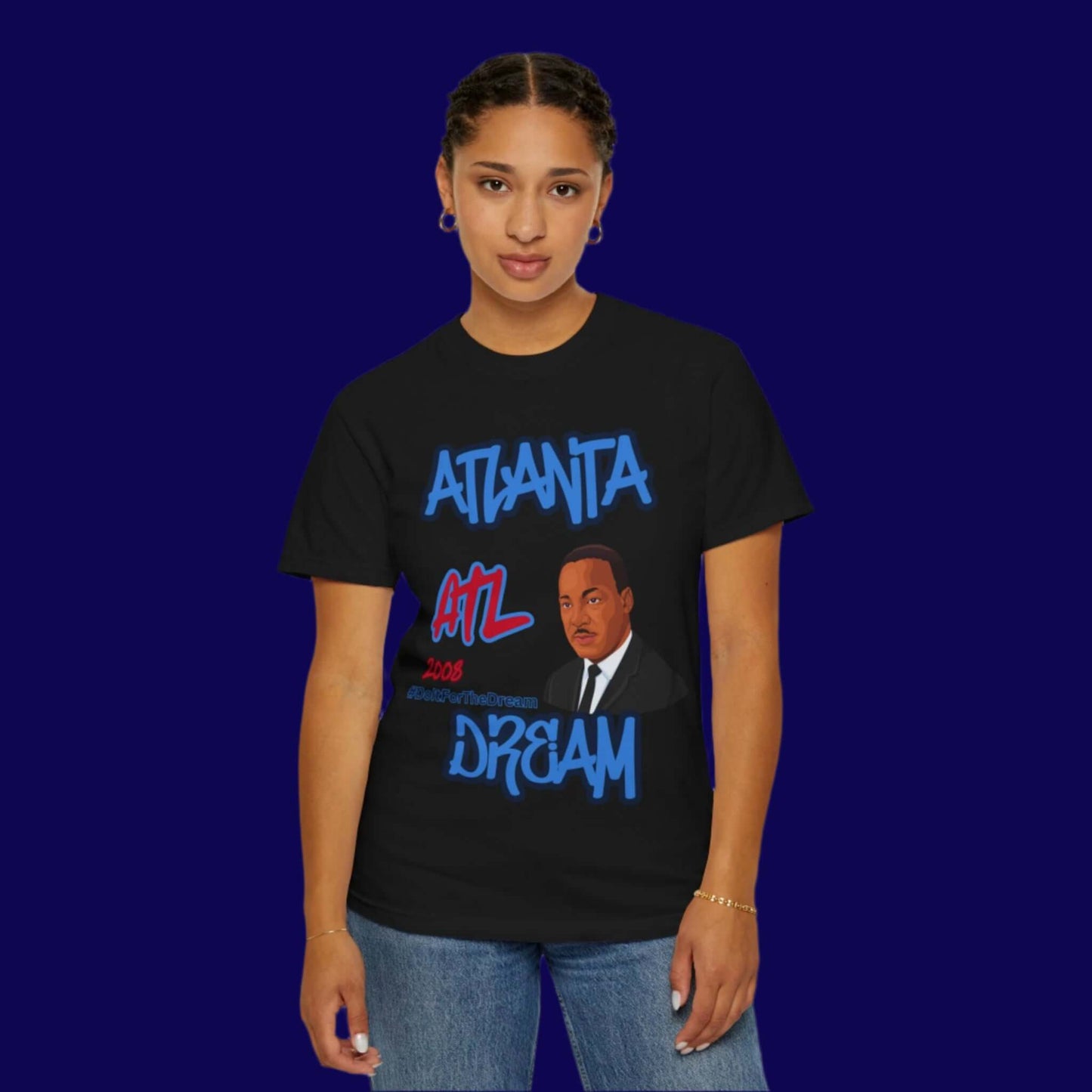 Atlanta Dream Basketball Fan Tee, This tee is perfect for fans of the Atlanta Dream professional women's basketball team. It offers a relaxed fit and classic design that can be styled for casual or semi-formal settings. Ideal for adults, this garment-dyed