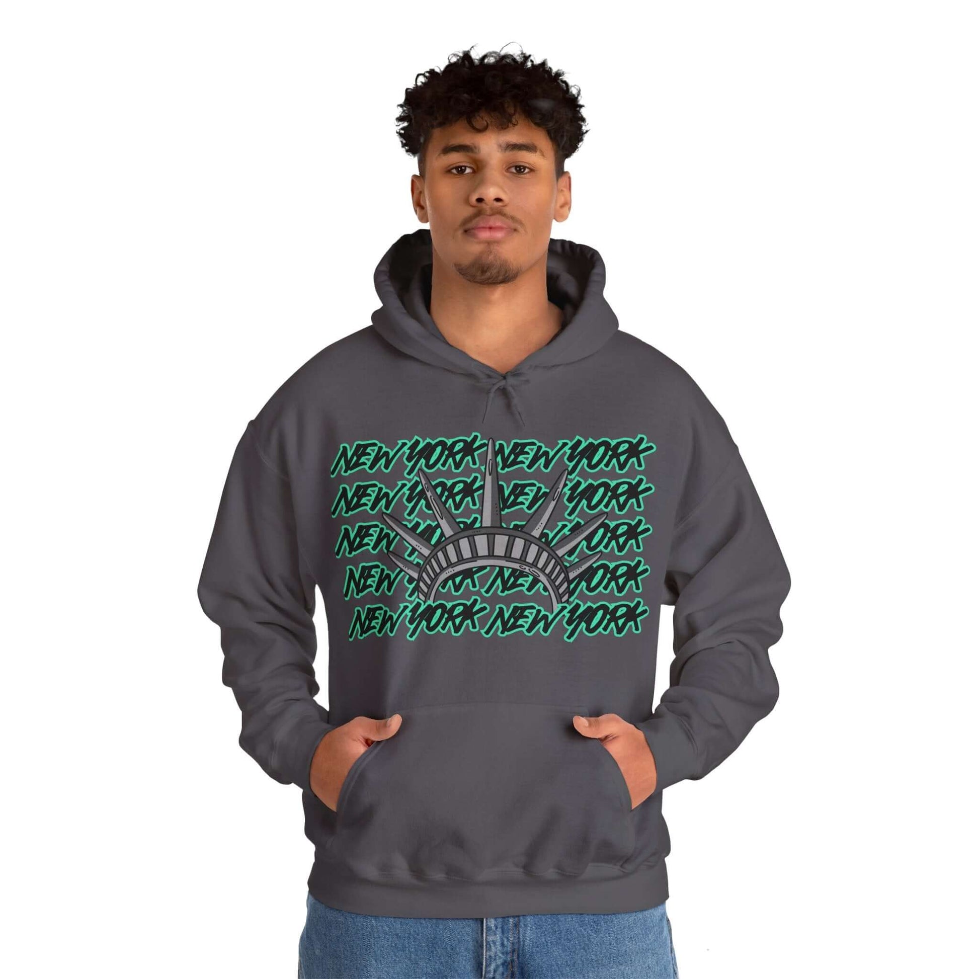 New York Hoodie This unique hoodie design is inspired by New York women's basketball (WBB). With New York in black Graffitti letters outlined in seafoam green. Featuring the a big Lady Liberty crown in gray. Unisex Soft and comfy 50% Cotton 50% Polyester