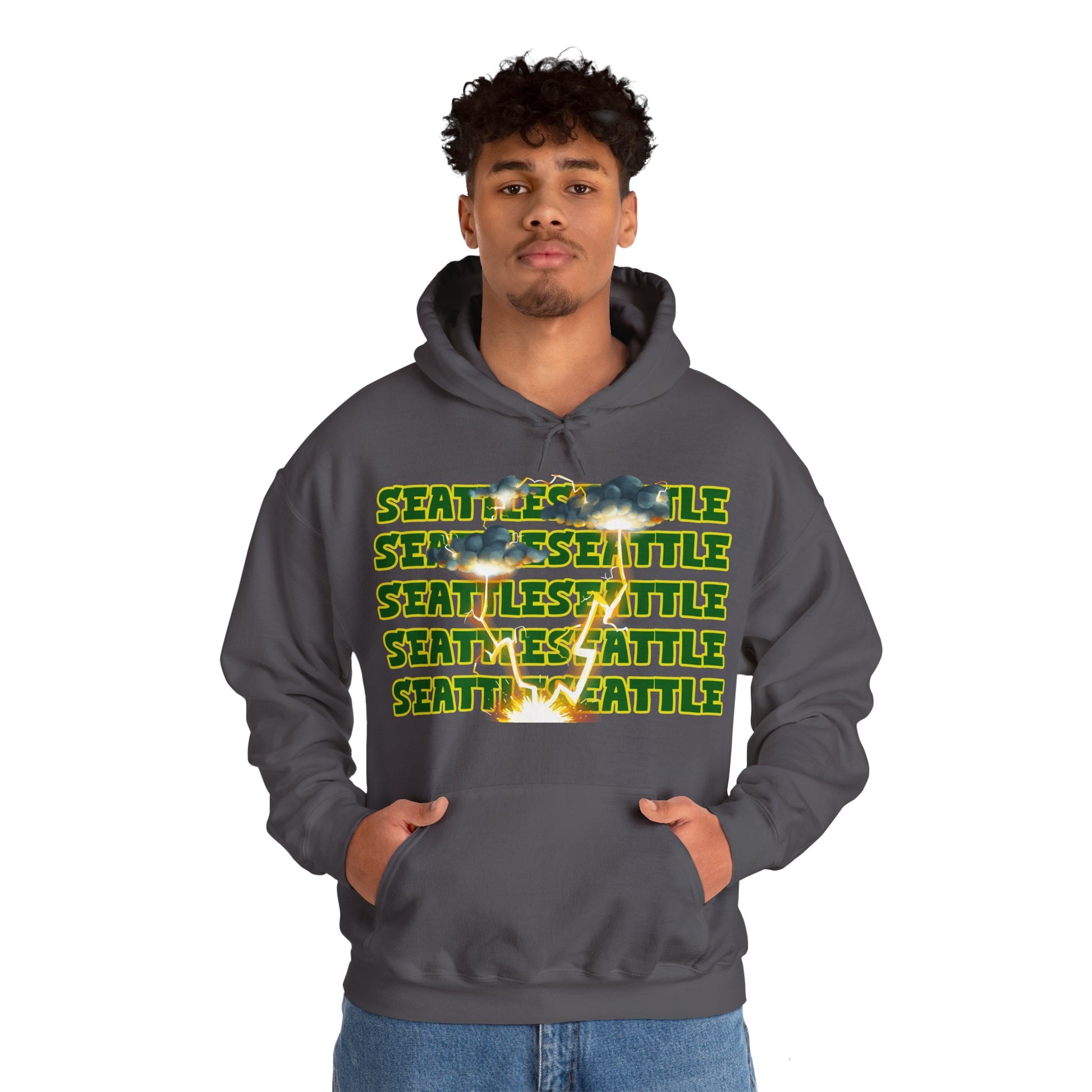 Seattle Hoodie This unique hoodie design is inspired by Seattle women's basketball (WBB). With Seattle in green letters with a yellow outline. Featuring dark gary storm clouds producing a lightning storm. This unisex hoodie is soft ands cozy Kanagroo pouc