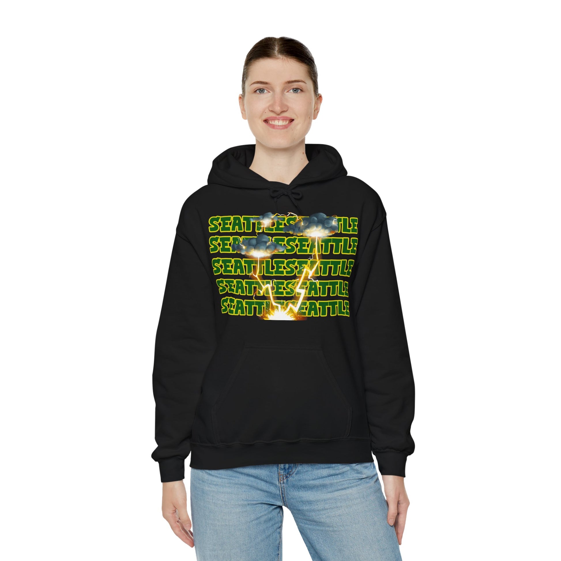 Seattle Hoodie This unique hoodie design is inspired by Seattle women's basketball (WBB). With Seattle in green letters with a yellow outline. Featuring dark gary storm clouds producing a lightning storm. This unisex hoodie is soft ands cozy Kanagroo pouc