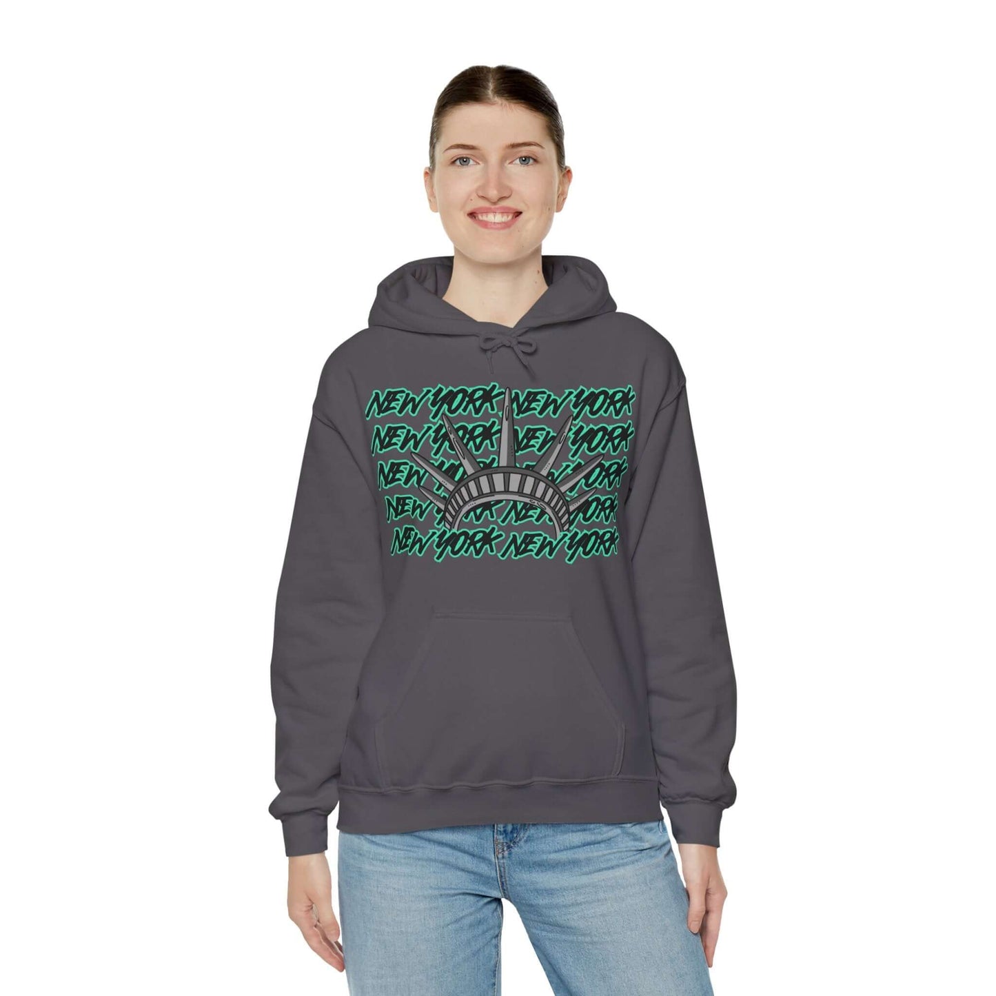 New York Hoodie This unique hoodie design is inspired by New York women's basketball (WBB). With New York in black Graffitti letters outlined in seafoam green. Featuring the a big Lady Liberty crown in gray. Unisex Soft and comfy 50% Cotton 50% Polyester