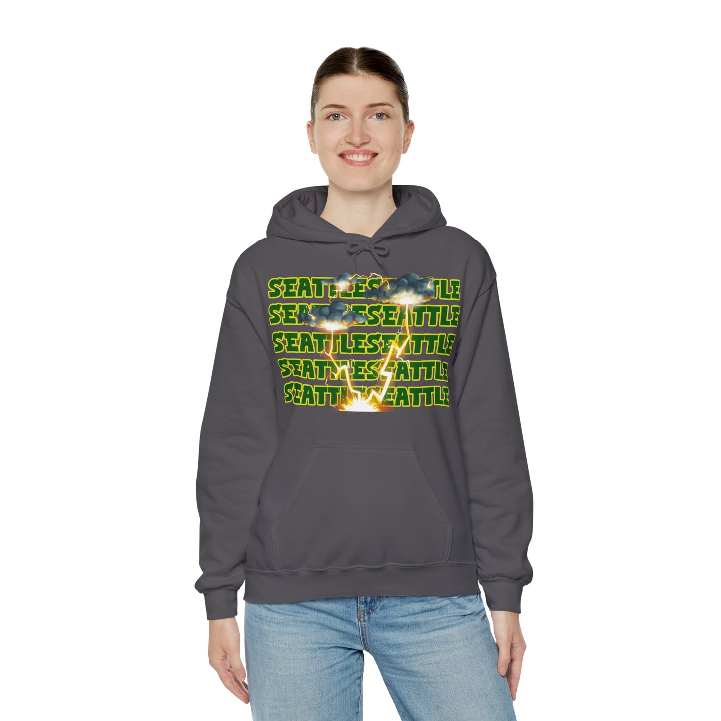 Seattle Hoodie This unique hoodie design is inspired by Seattle women's basketball (WBB). With Seattle in green letters with a yellow outline. Featuring dark gary storm clouds producing a lightning storm. This unisex hoodie is soft ands cozy Kanagroo pouc